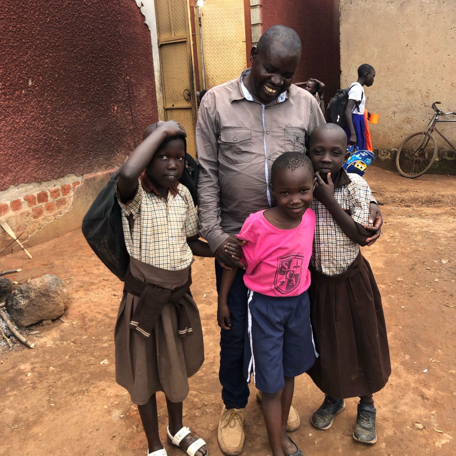 Francis Candiga and some children from the Village